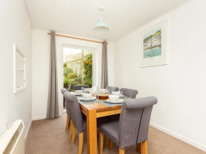 The dining area opens out on to the sunny rear garden.