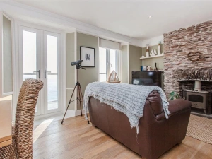 The living room with woodburner stove.