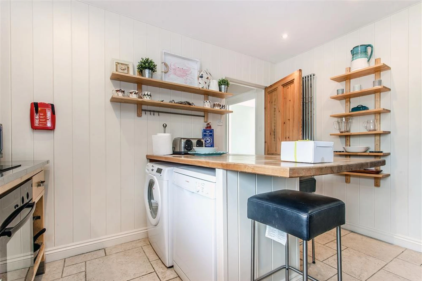 Another view of the kitchen. 