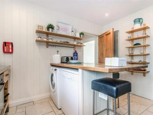 Another view of the kitchen. 