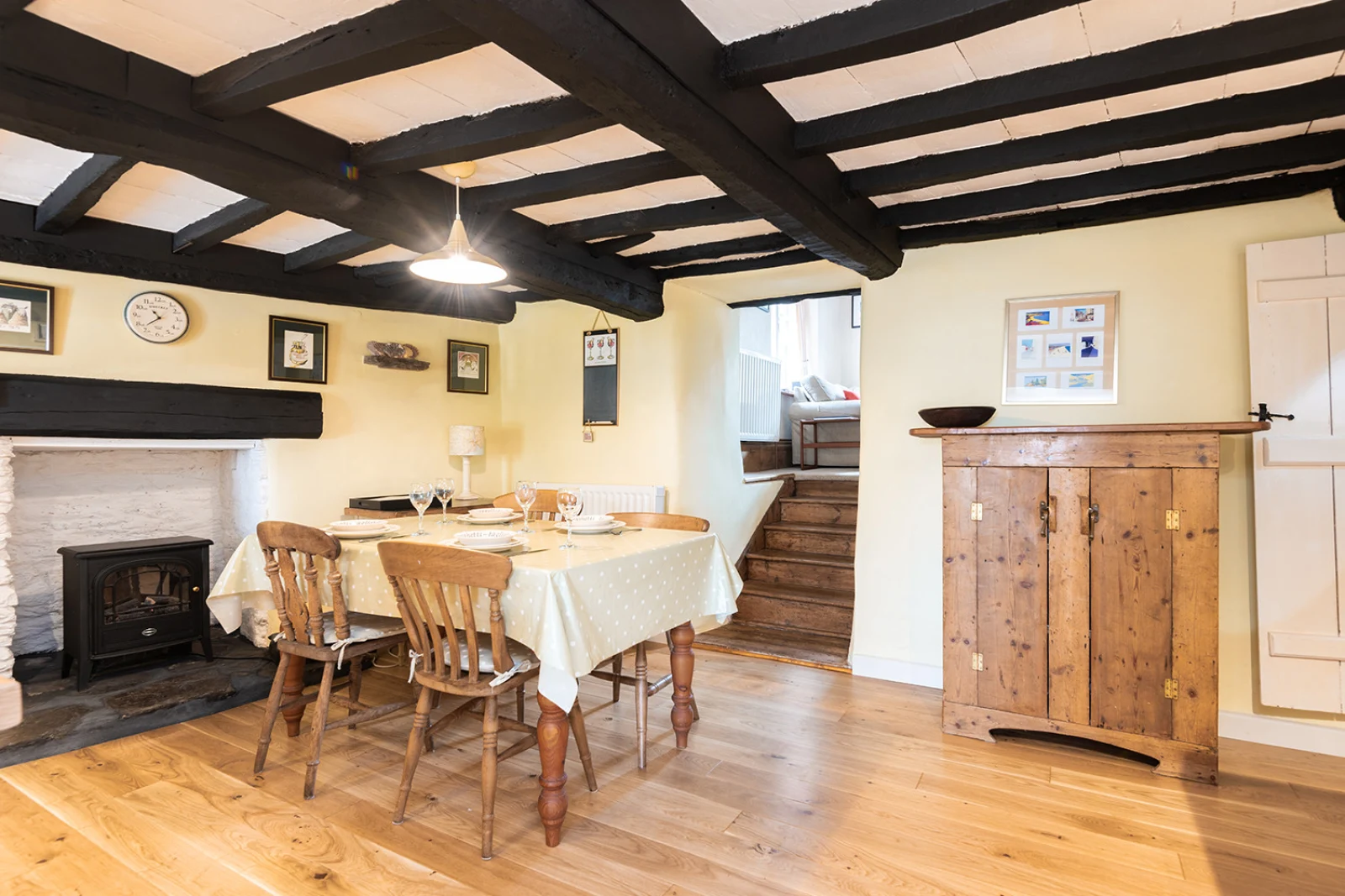 the dining area in this traditional cottage