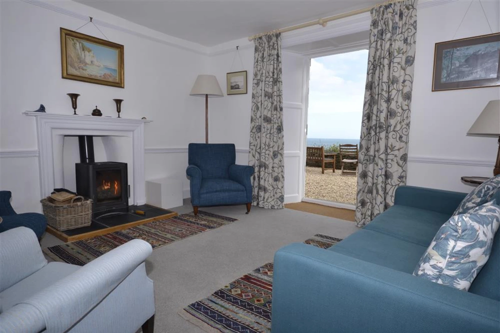 The sitting room with doors to the front terrace.
