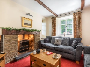 Cosy lounge with log burner -perfect for romantic breaks or cosy up with friends and family near the sea in South Devon