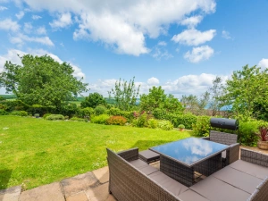 Space to relax and dine al fresco with glorious views over the fields and out to sea