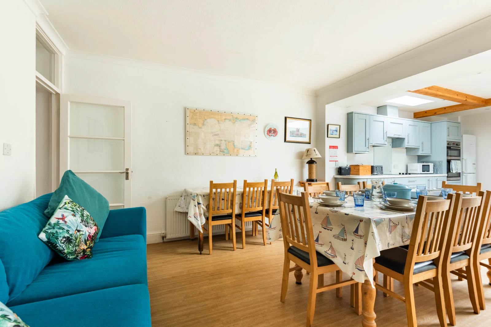 The kitchen diner with a large sofa for relaxing