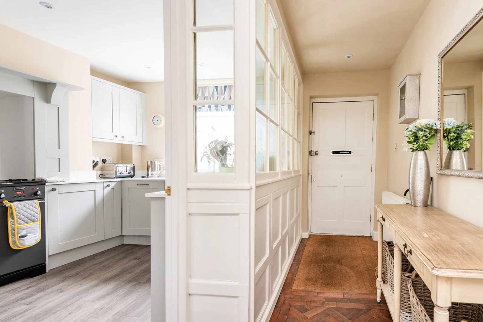 Entrance hallway with feature window wall through to the kitchen.