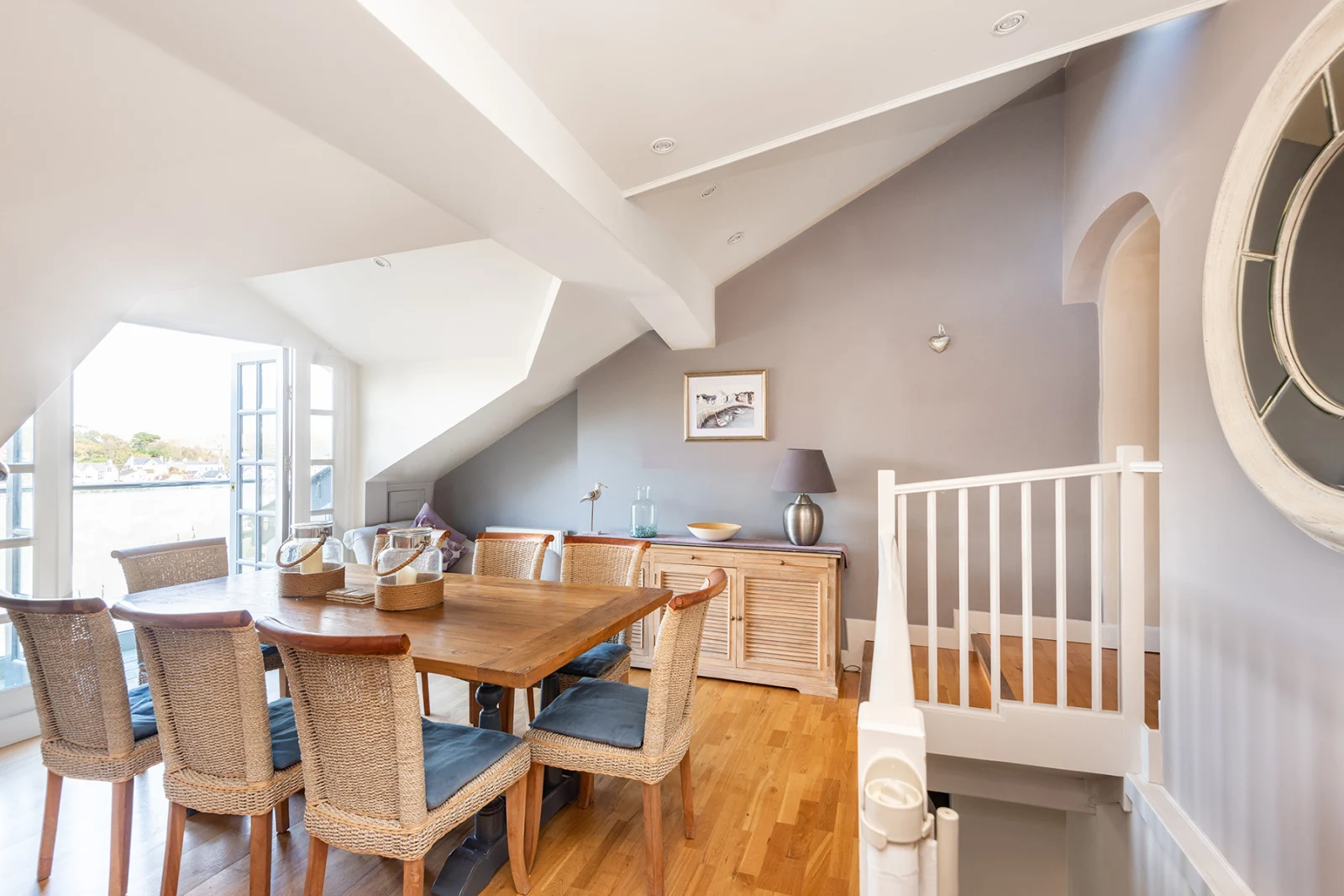 Separate dining room with table and seating for 8.