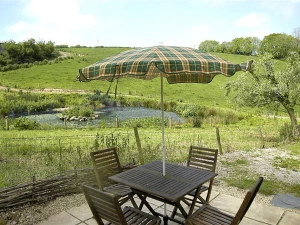 The patio overlooking the neighbouring pond