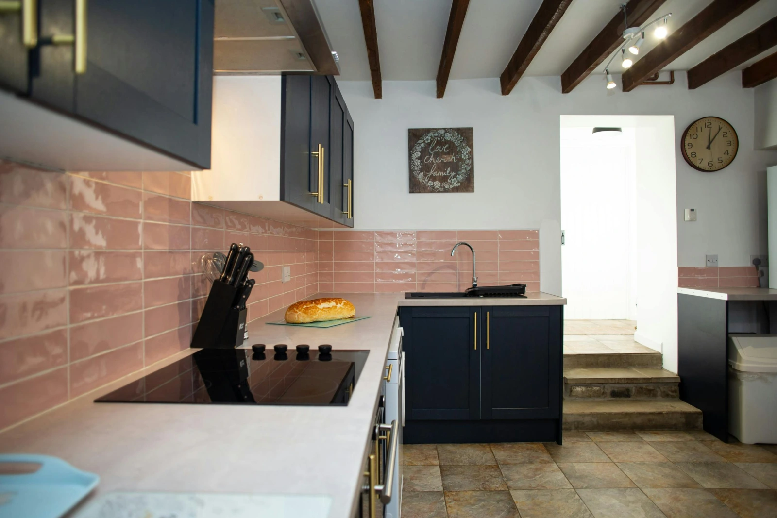 Kitchen with electric hob and plenty of storage