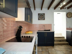 Kitchen with electric hob and plenty of storage