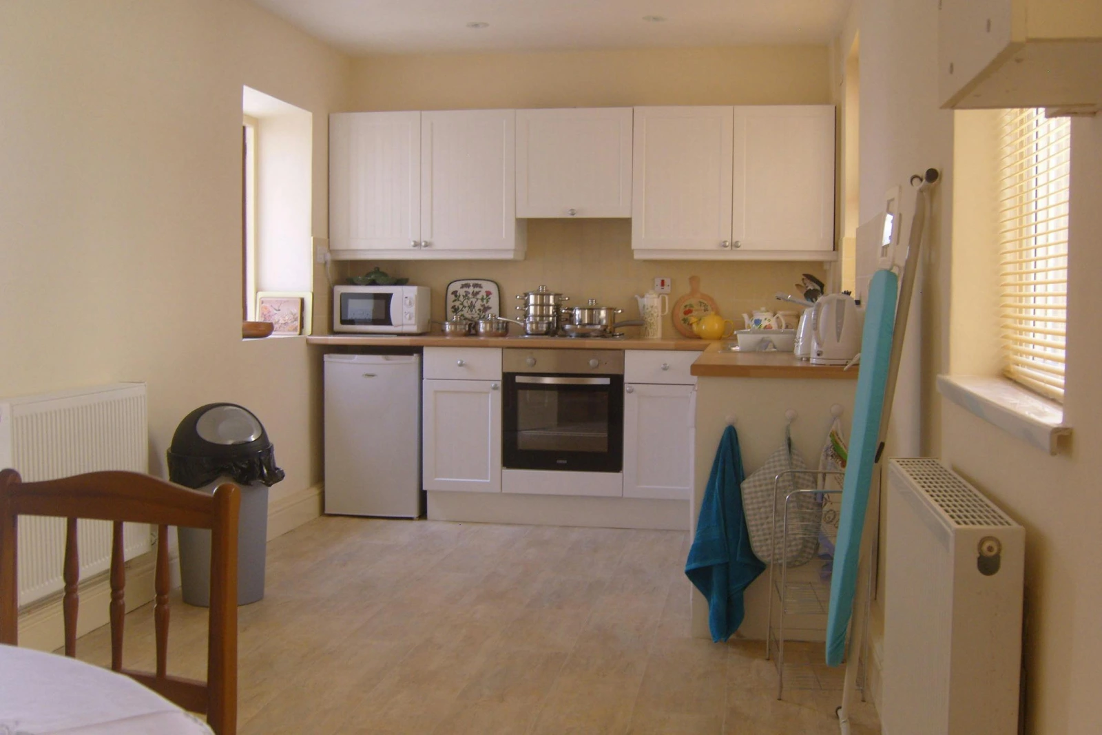 Well equipped kitchen, with electric oven and hob, microwave, kettle, toaster and fridge