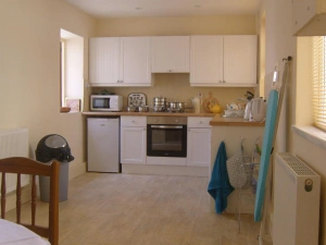 Well equipped kitchen, with electric oven and hob, microwave, kettle, toaster and fridge