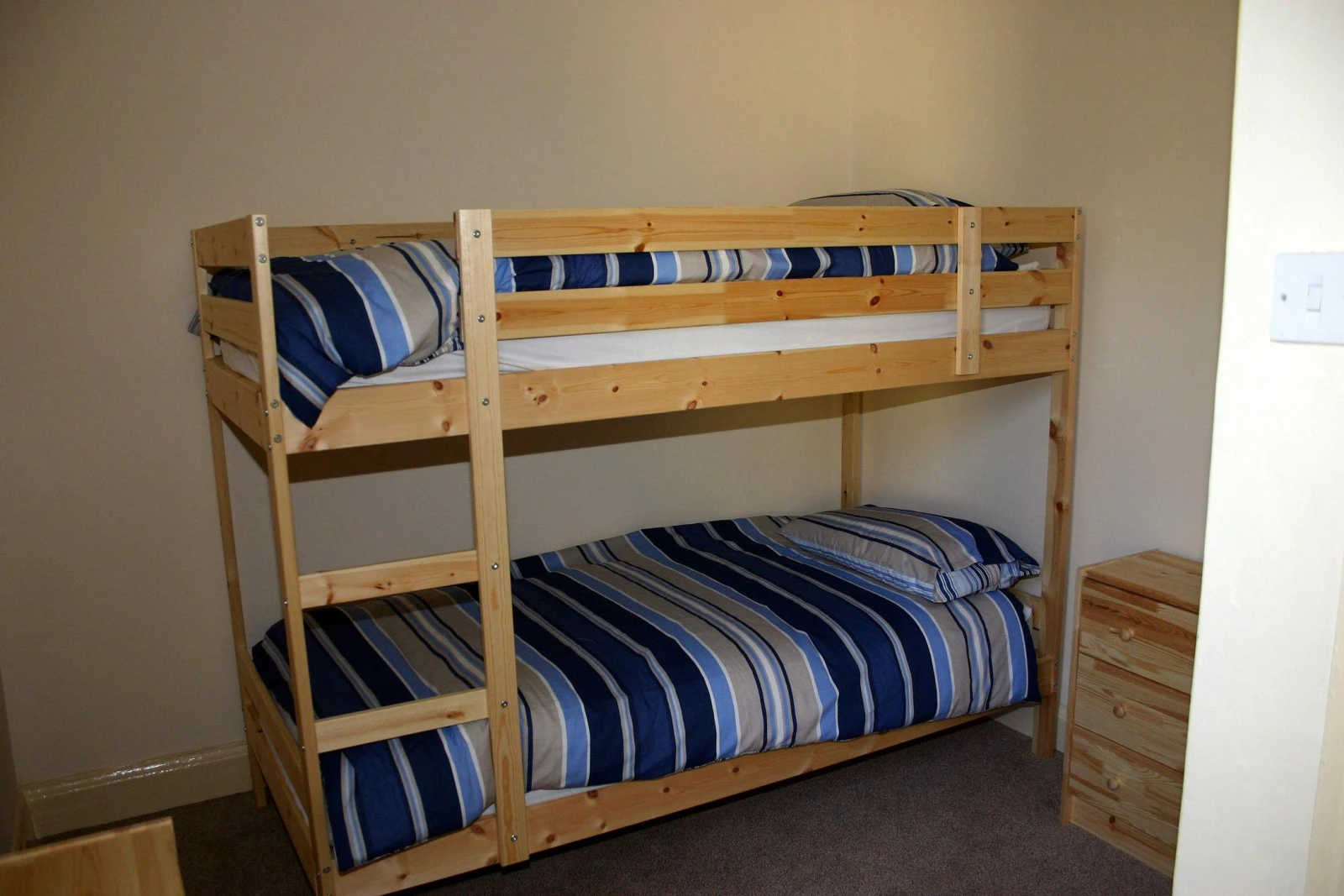 Bunk beds and small chest of drawers