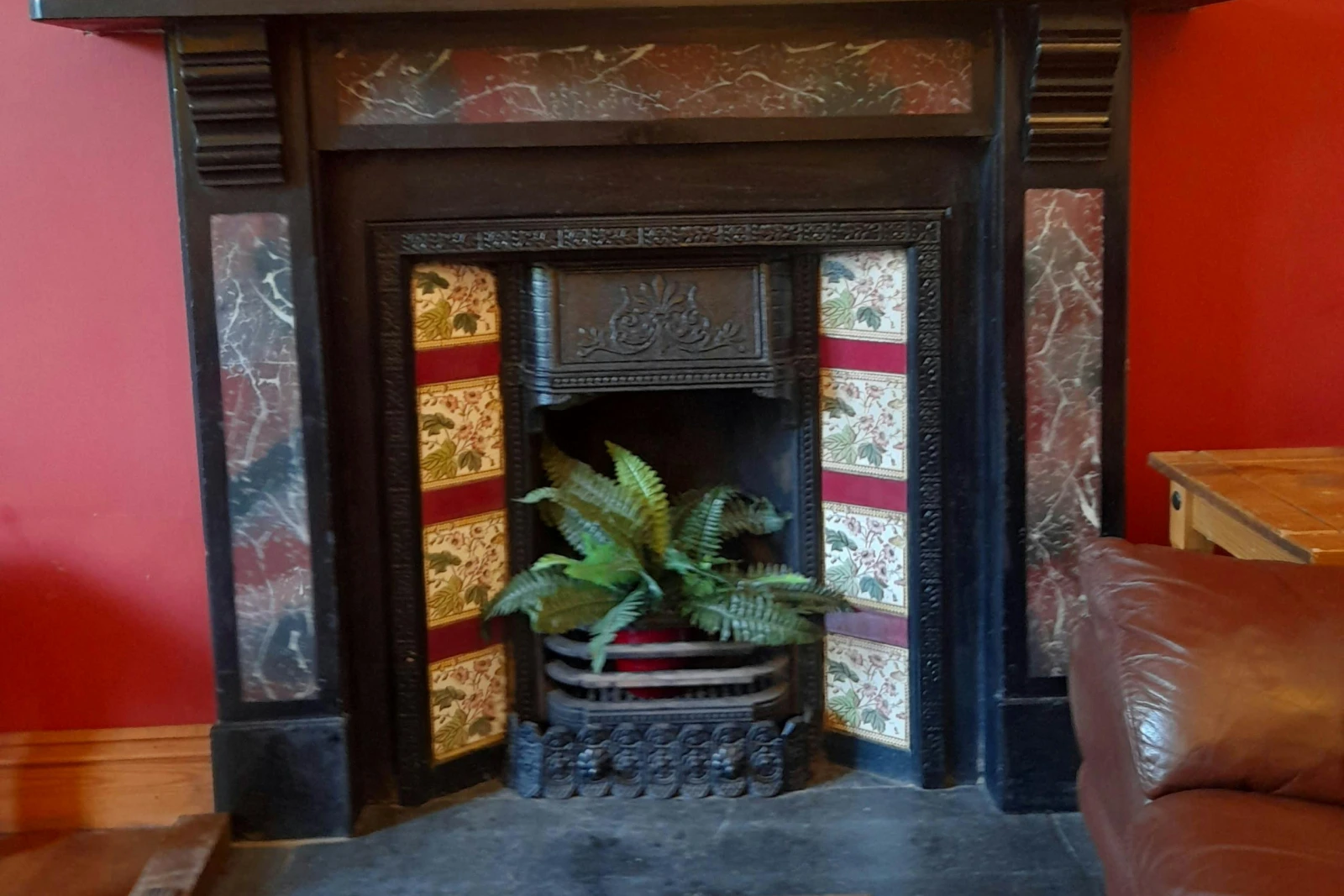 Fireplace at Uplands, tiled fire surround and slate hearth