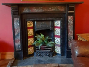 Fireplace at Uplands, tiled fire surround and slate hearth