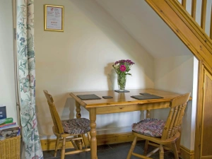 Dining table with two chairs