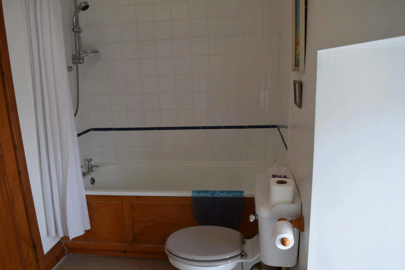 First floor main bathroom, shower over bath, toilet