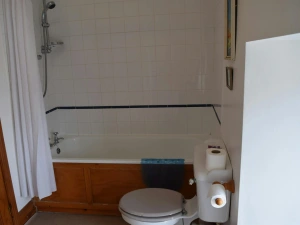 First floor main bathroom, shower over bath, toilet
