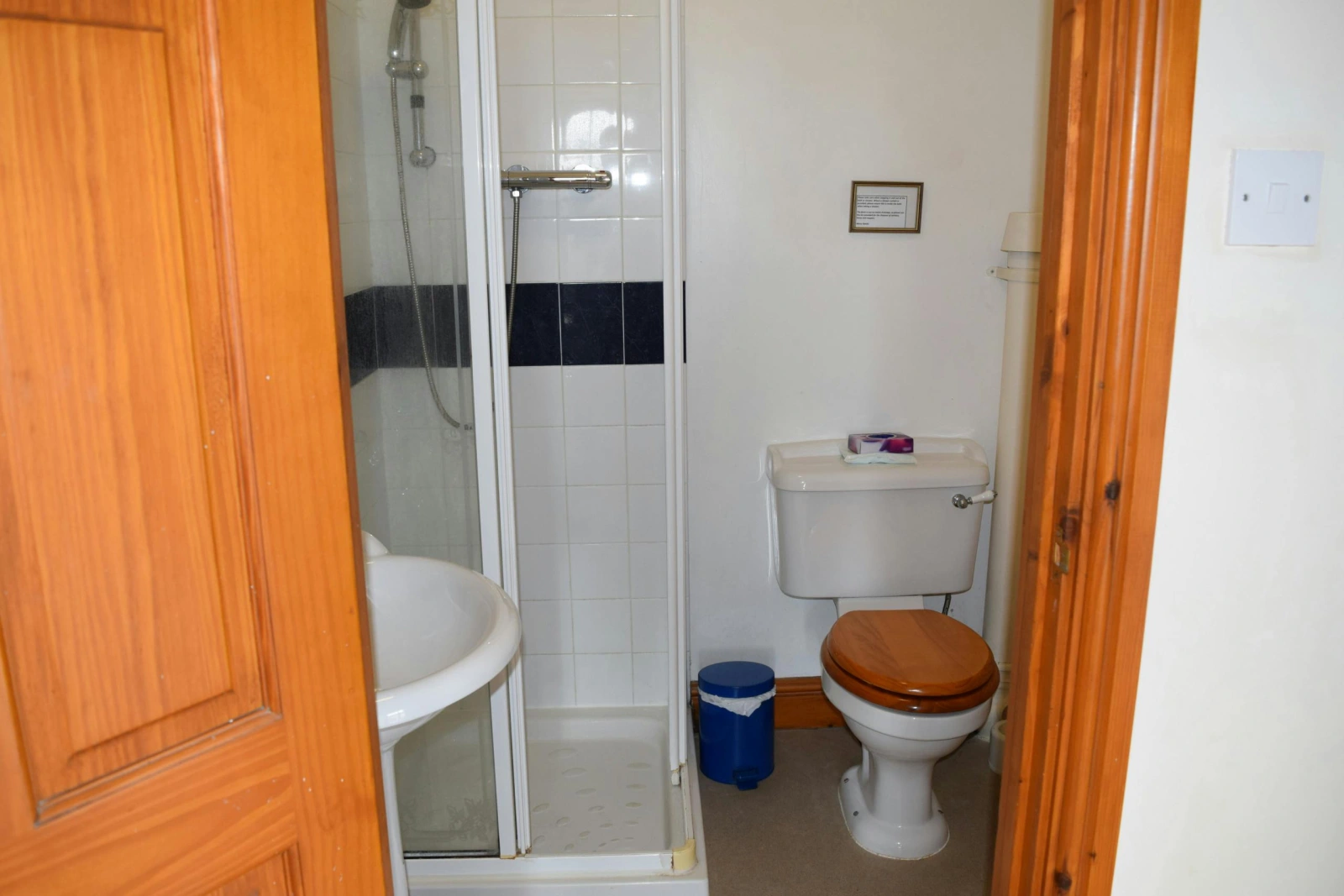 First floor en-suite shower room with WC and hand basin