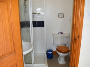 First floor en-suite shower room with WC and hand basin