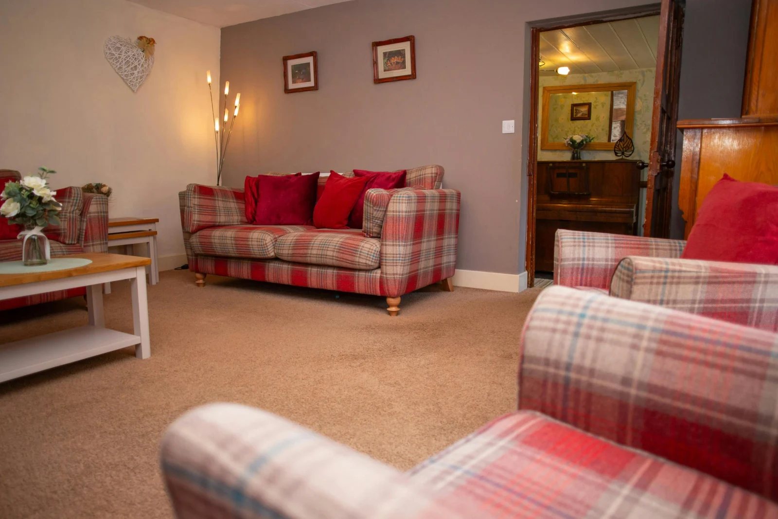 Sofa, armchairs, floor lamp, nest of tables and coffee table