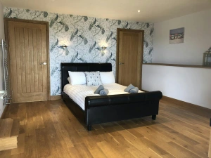 Black leather double bed