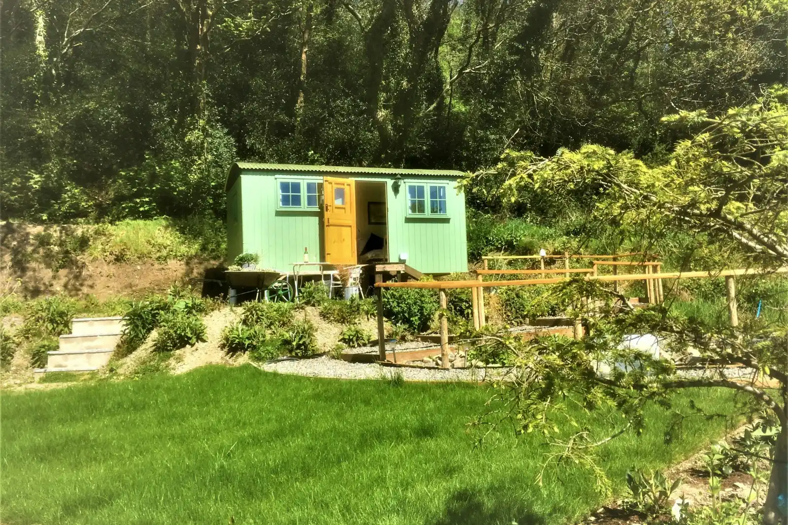 View across garden to shepherds hut