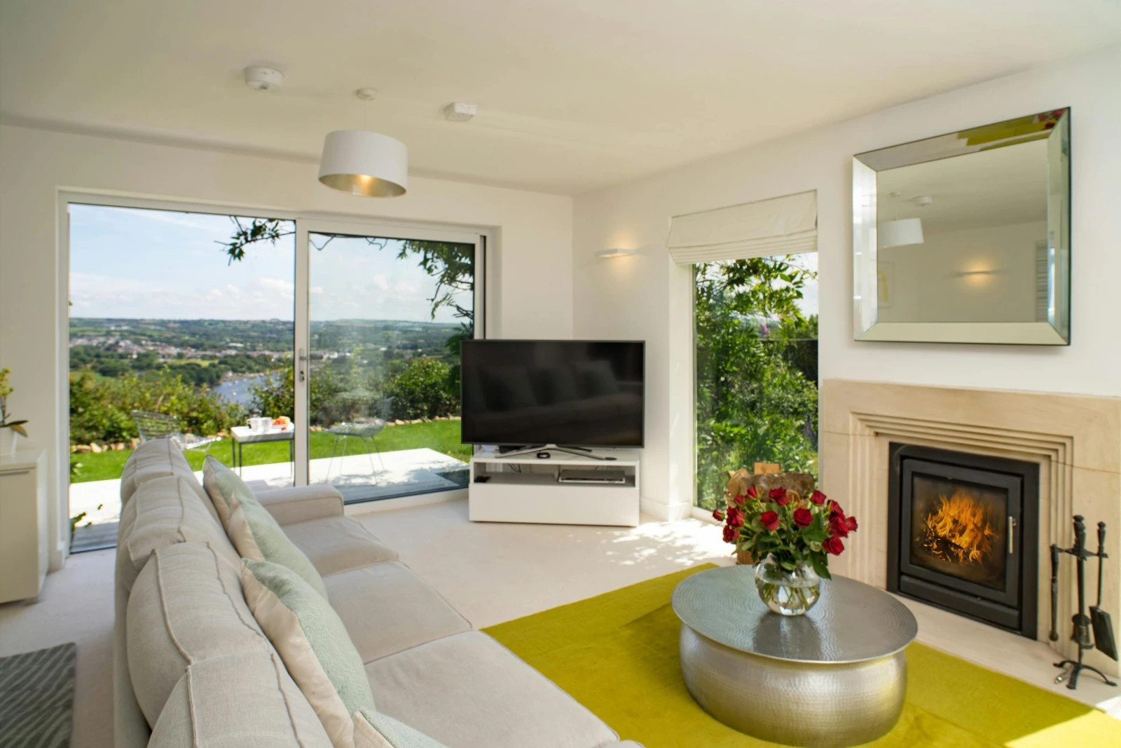 6-seater sofa, TV, wood burning stove and coffee table