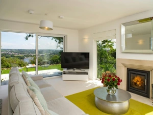 6-seater sofa, TV, wood burning stove and coffee table