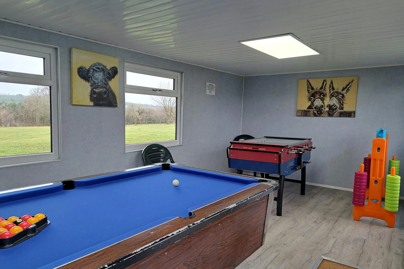Games room with table football, pool table and Connect 4