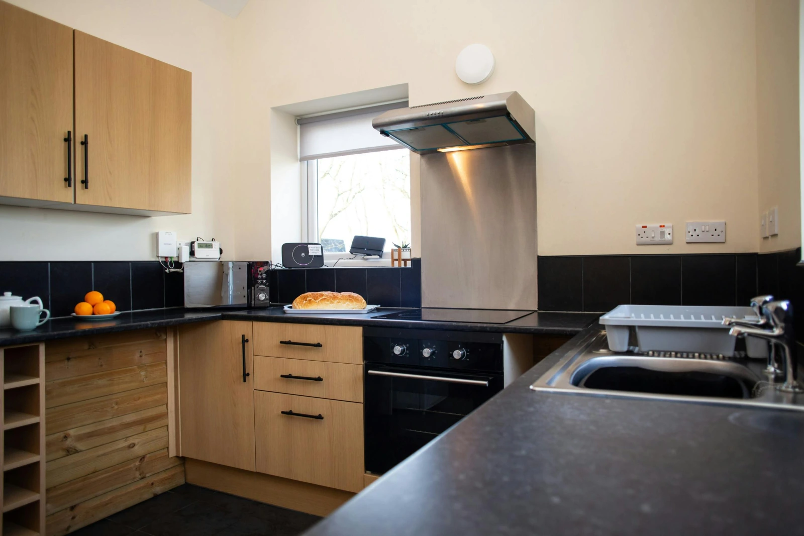 Kitchen: electric cooker with extractor hood and microwave