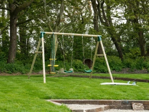 Garden with swings at Towyn Farmhouse