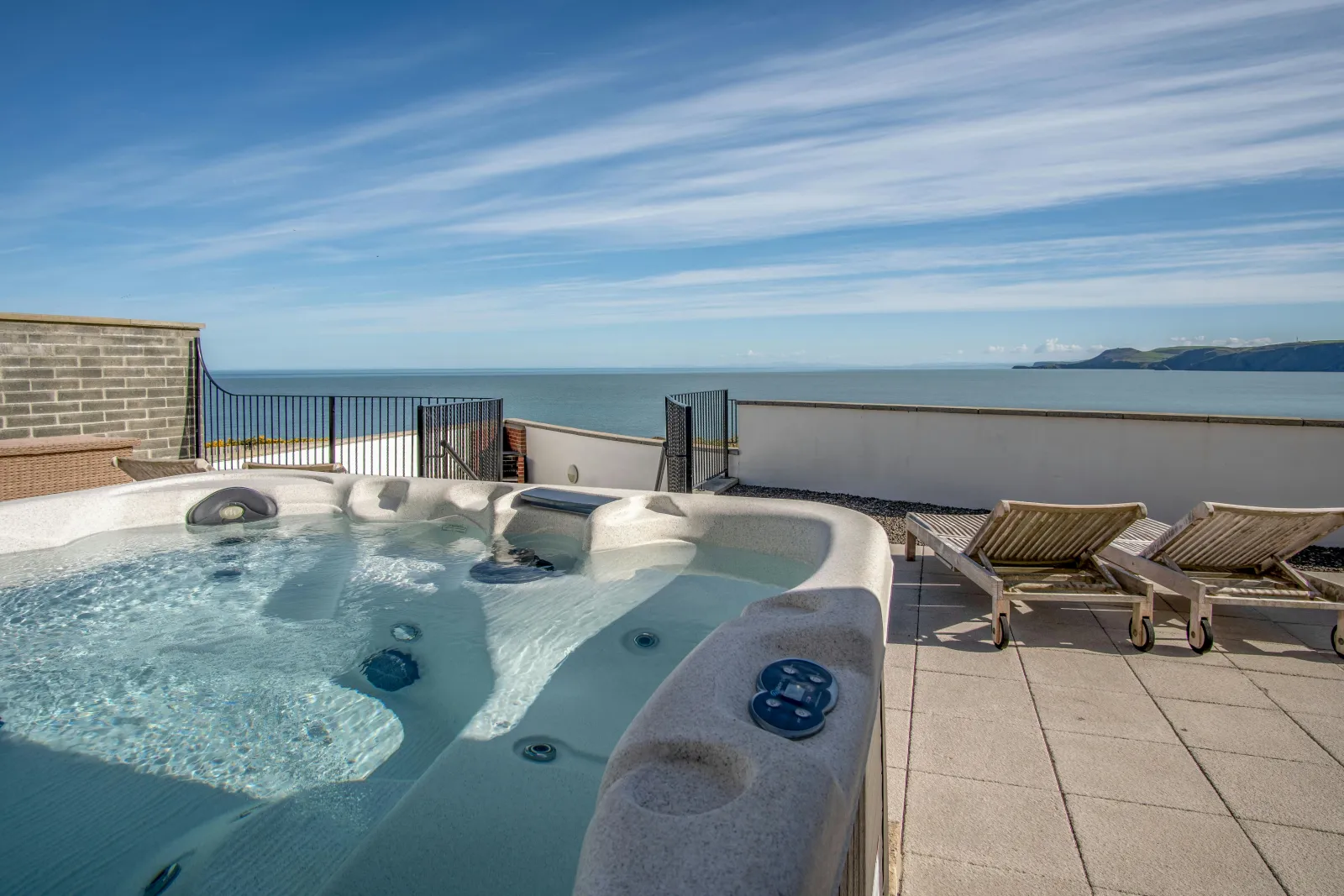 Hot tub on the patio, 2 steamer seats and sea views