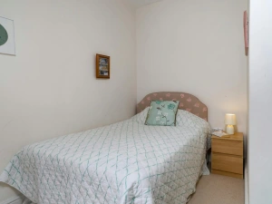 Single bed, bedside cabinet and lamp