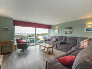 Large corner sofa, armchair and large picture window