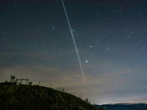 Night sky with shooting star