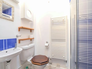 Toilet, shower enclosure, hand basin