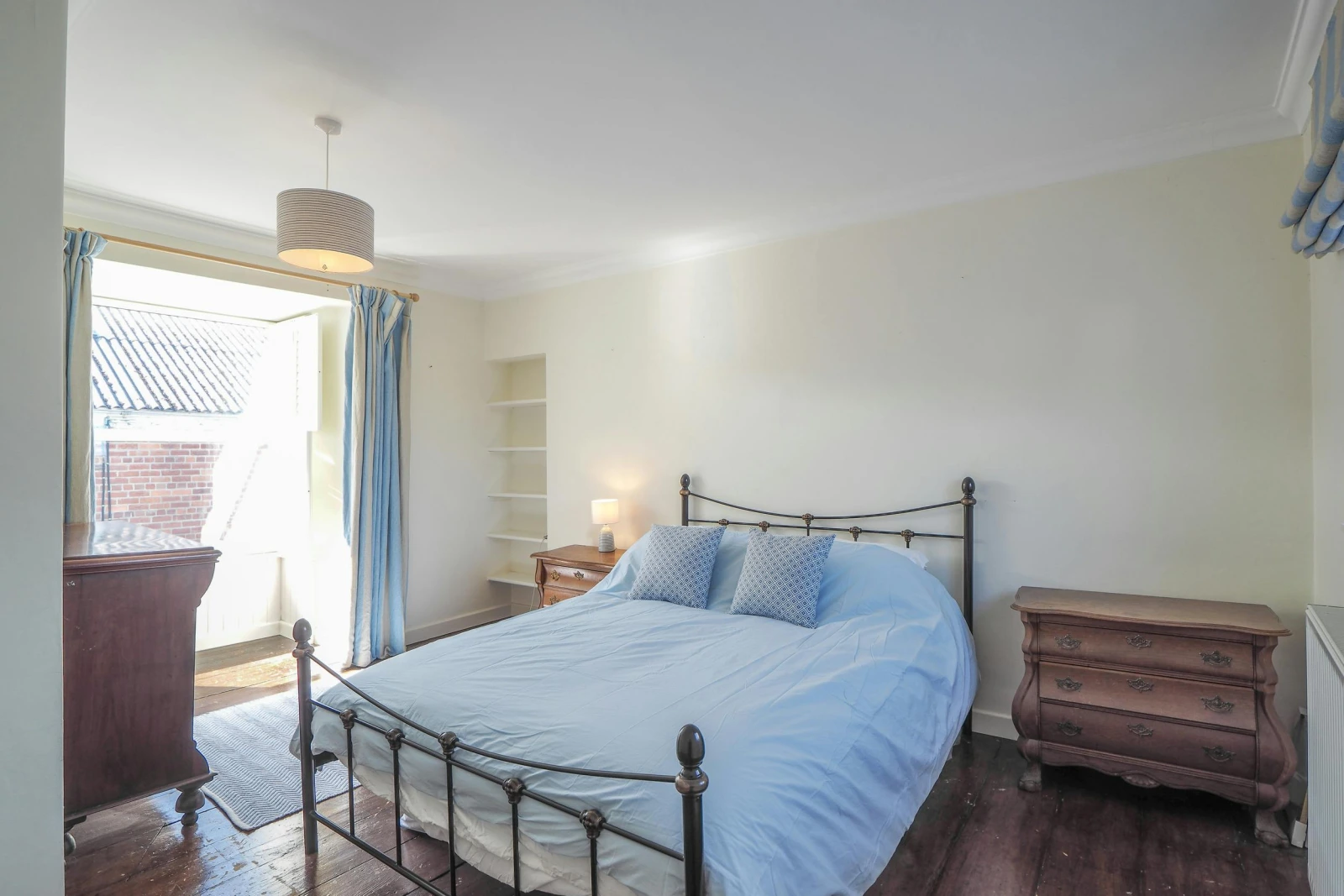 King size bed, chest of drawers, bedside cabinet and lamp
