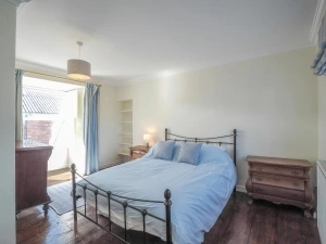 King size bed, chest of drawers, bedside cabinet and lamp