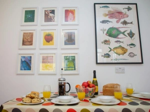 Kitchen table laid for breakfast