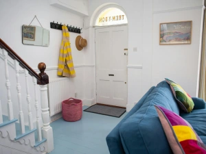 Front door leading directly into the sitting room
