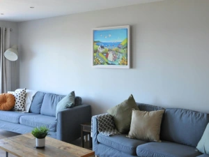 Two large sofas, coffee table and floor lamp
