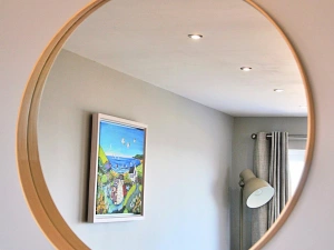 Wall mounted round mirror