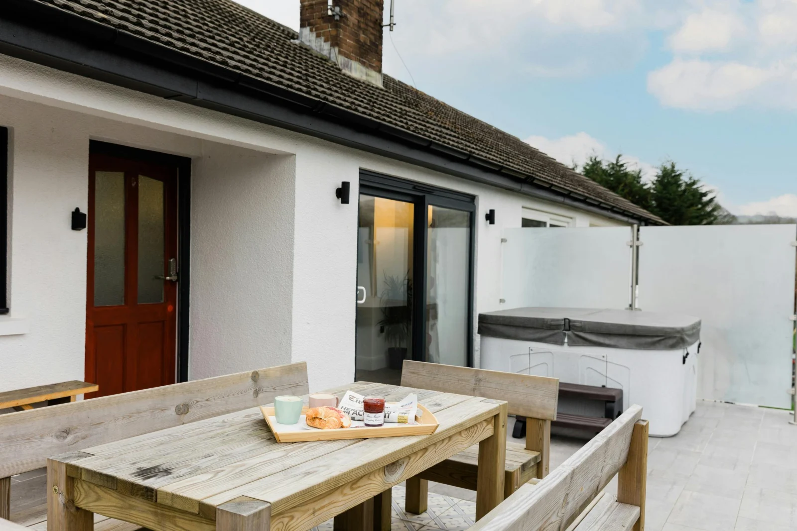 Outside hot tub and picnic bench.