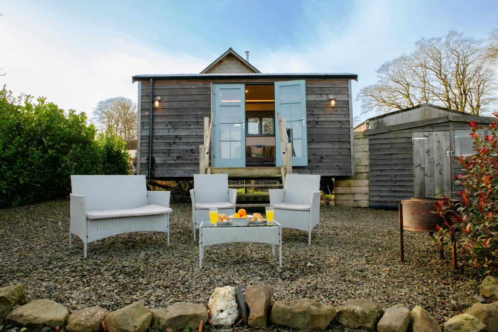 Gravel patio are with garden table and chairs