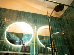 Electric shower and fully tiled bathroom