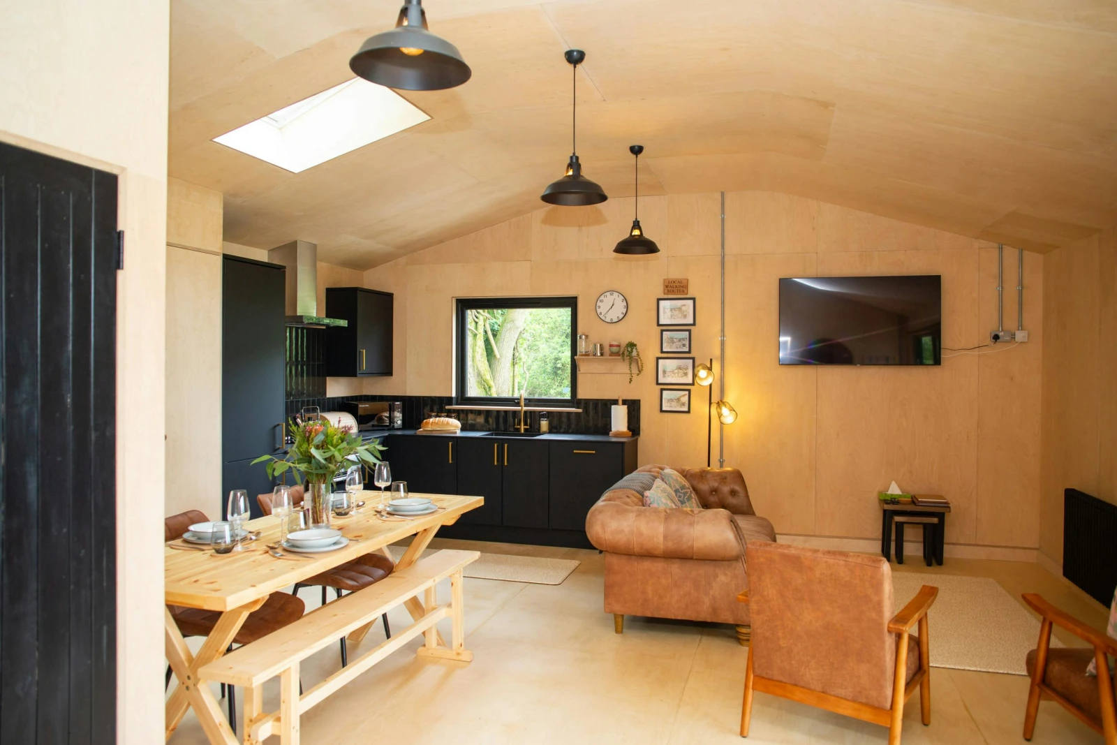 Kitchen with Velux window and window looking to the trees