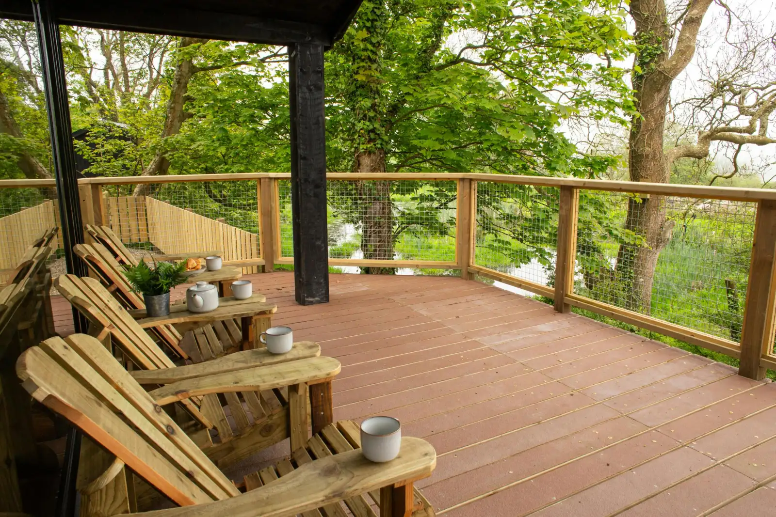 Veranda with wooden seating and views over the lake