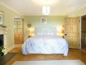 Super king bed, bedside cabinets with lamps and chest of drawers