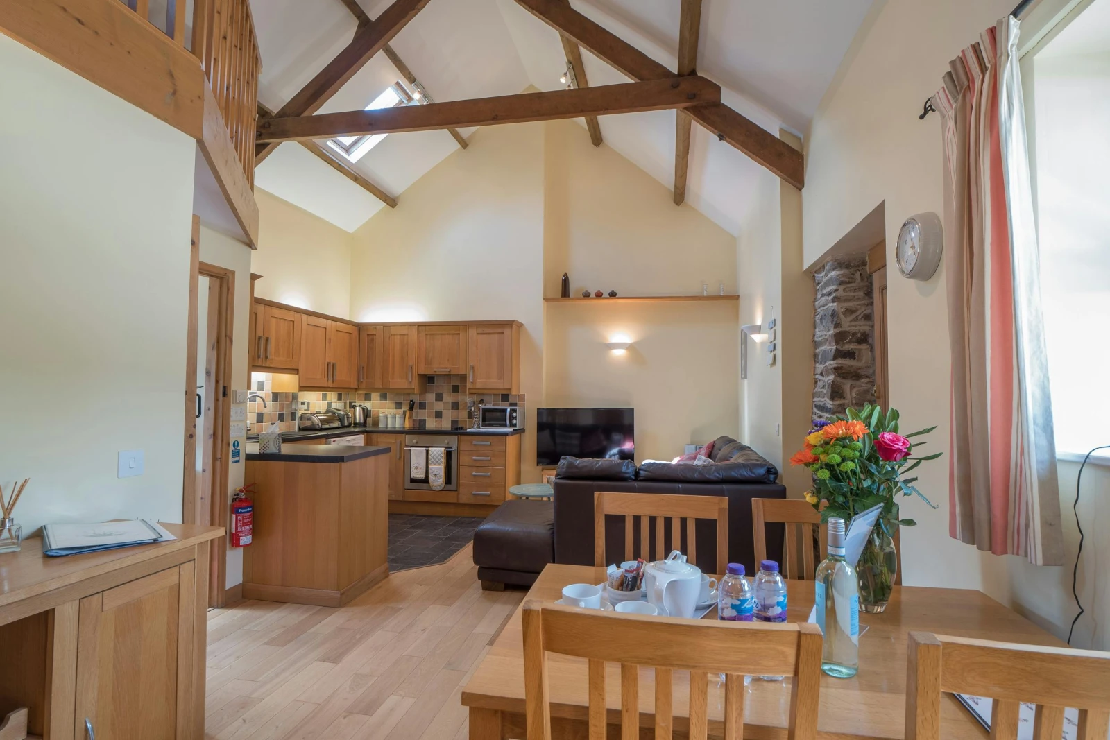 Open plan dining/ living/ kitchen in Eirlys